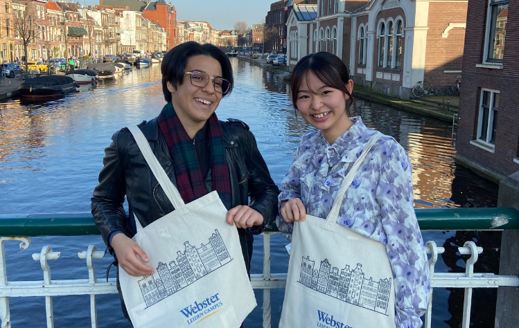 Open Day attendees pose in front of Leiden Campus