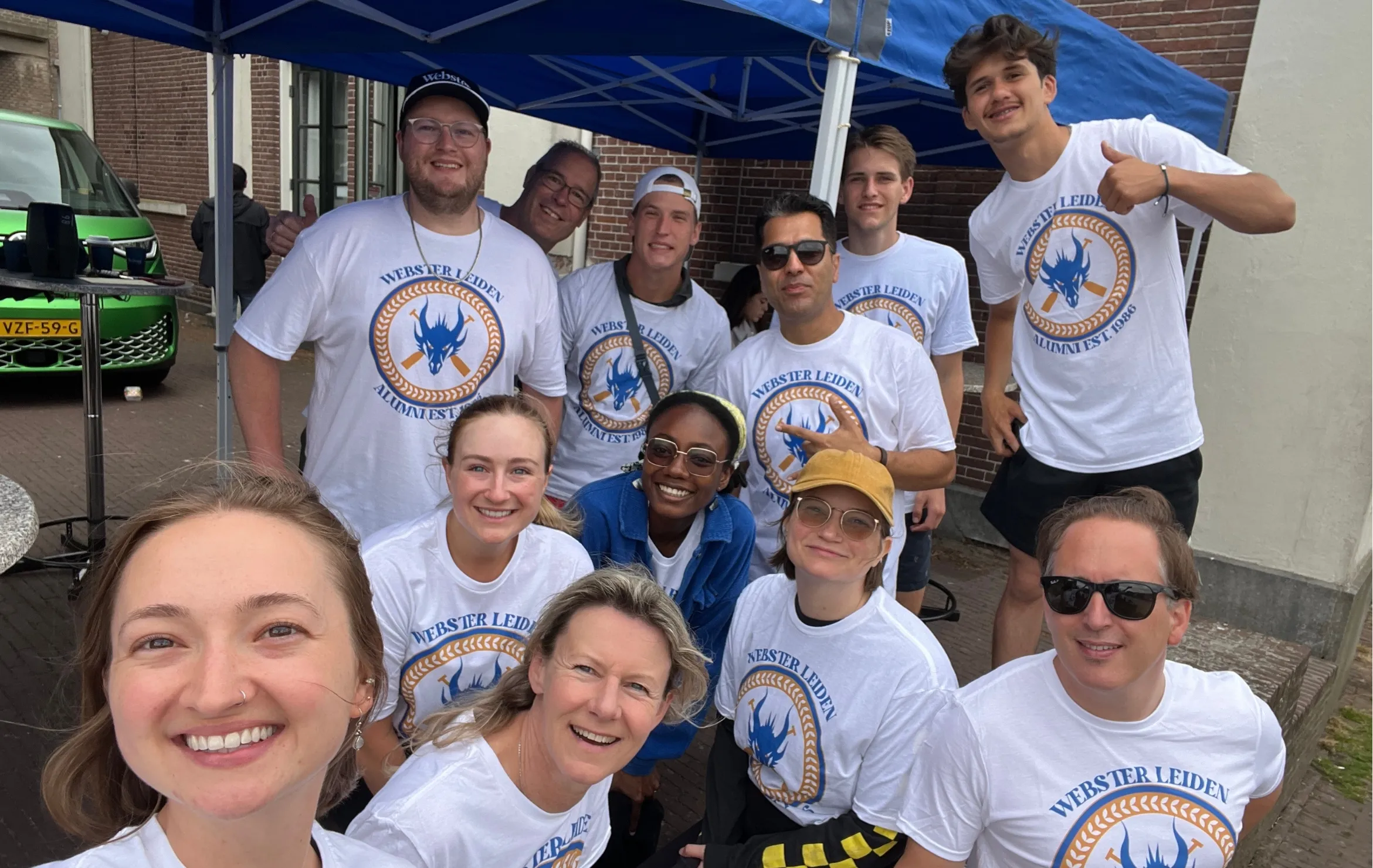 The Webster Gorloks dragonboat race rowing team poses for a selfie
