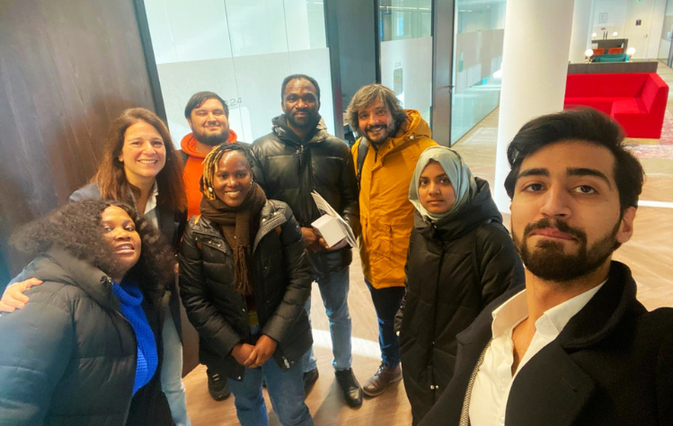Head of the European Investment Bank, Chantal Schrijver, International Relations Professor Ernani Contipelli and international relations graduate students pictured at the European Investment Bank in Amsterdam.